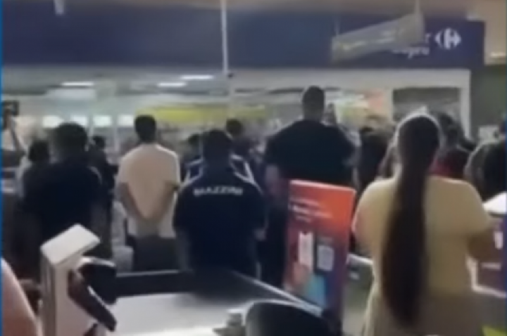 VEJA imagens de 'caixa' de farmácia feita refém por homem armado