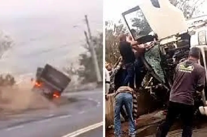VÍDEO: Caminhão tomba em curva perigosa e motorista fica ferido