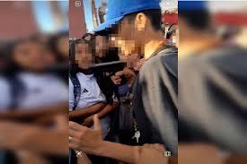 Em briga entre alunas, jovem mira arma na cabeça de uma delas