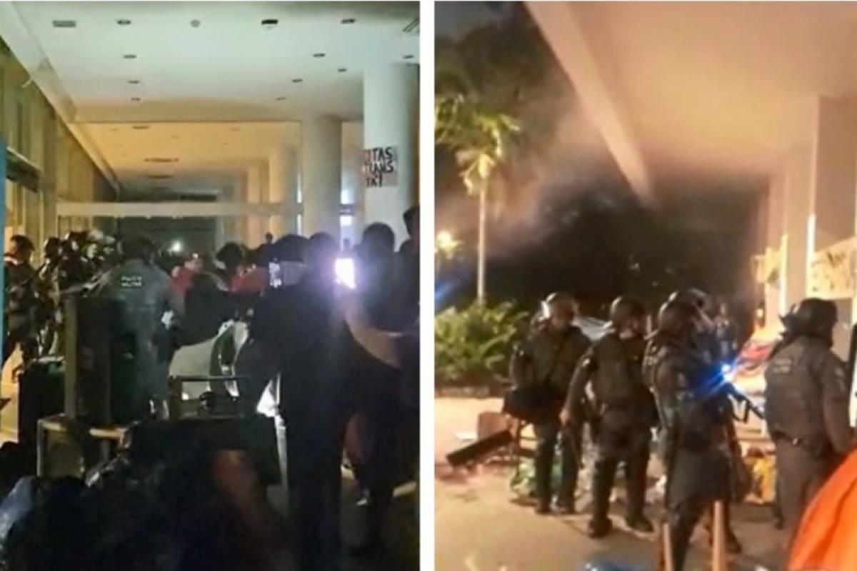 PM usa bombas, 'corredor polonês' e gás para desocupar reitoria