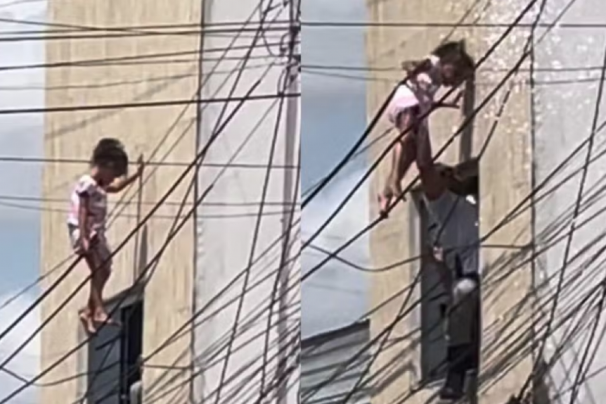 Criança fica presa em fiação após cair de janela
