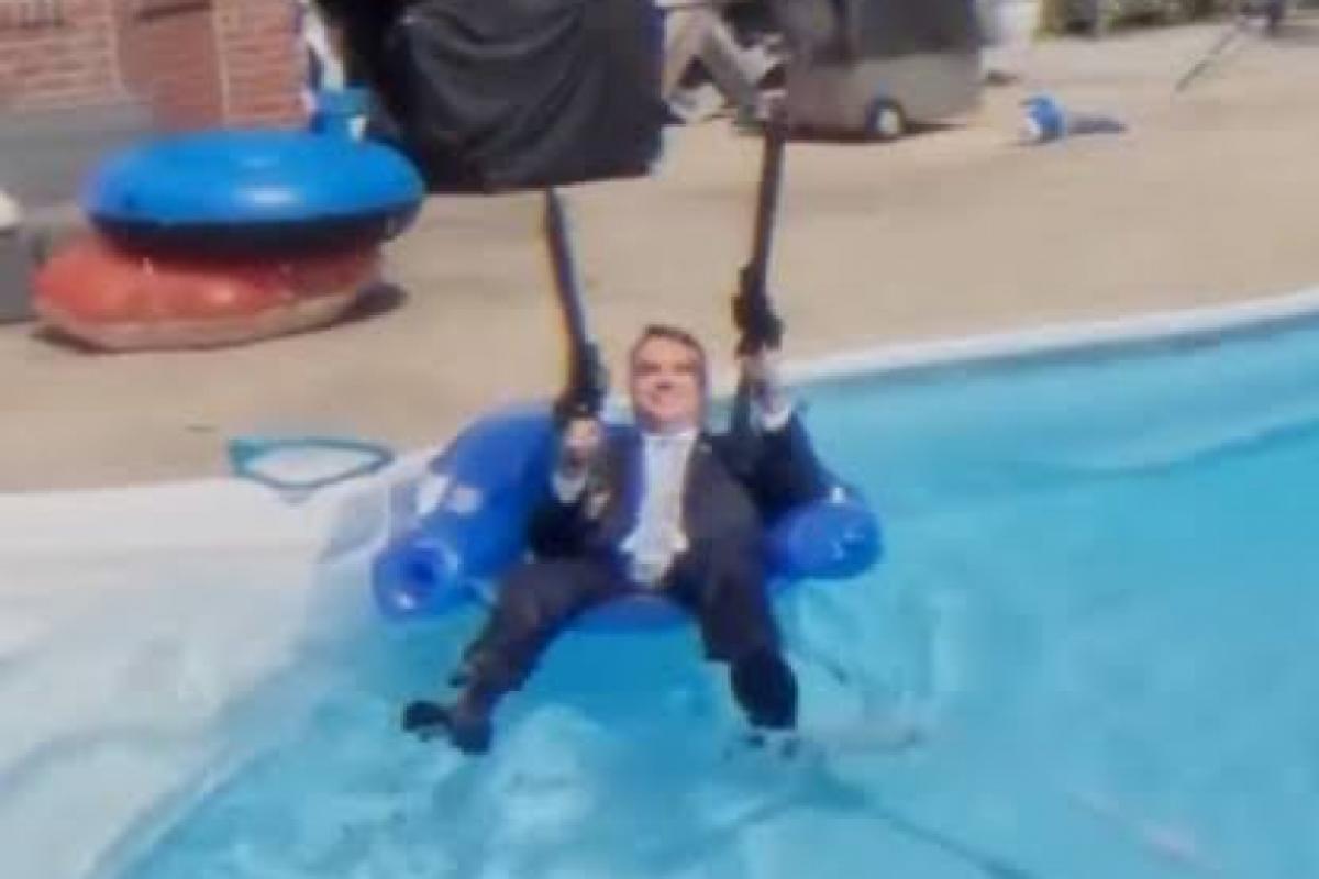 Nikolas posta vídeo feito com IA de Flávio atirando com 2 fuzis